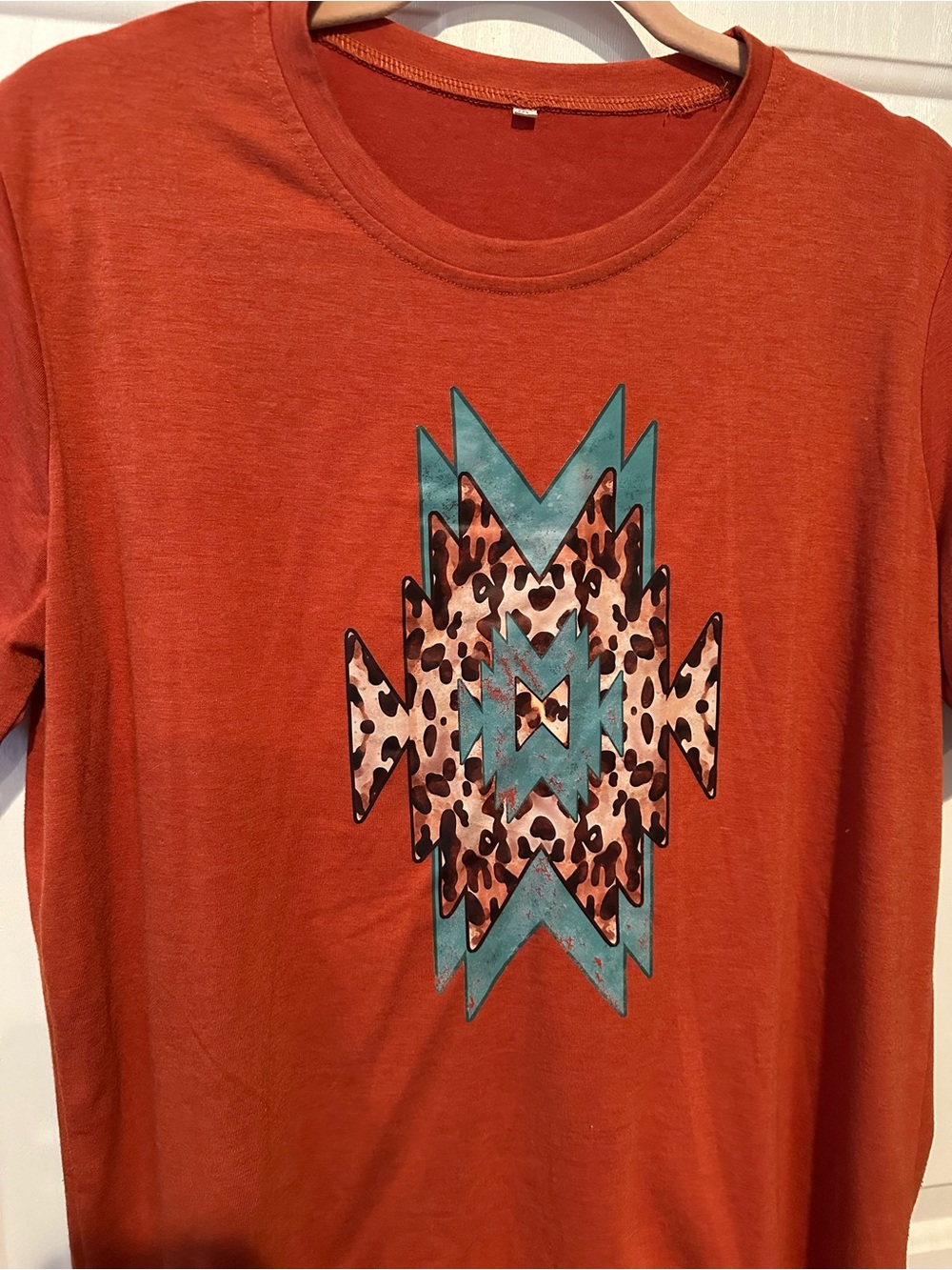 Women's Rust Orange Graphic Tee with Turquoise & Leopard Accent